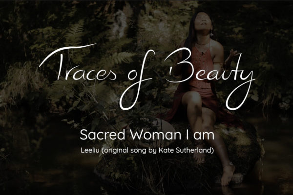 A serene woman sits on a rock by a forest stream, embodying tranquility and connection with nature.